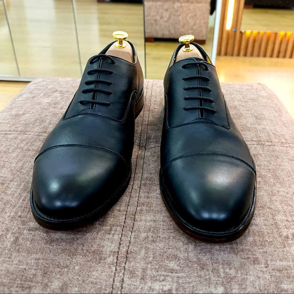OXFORD CLASICO NEGRO SUELA CAFE